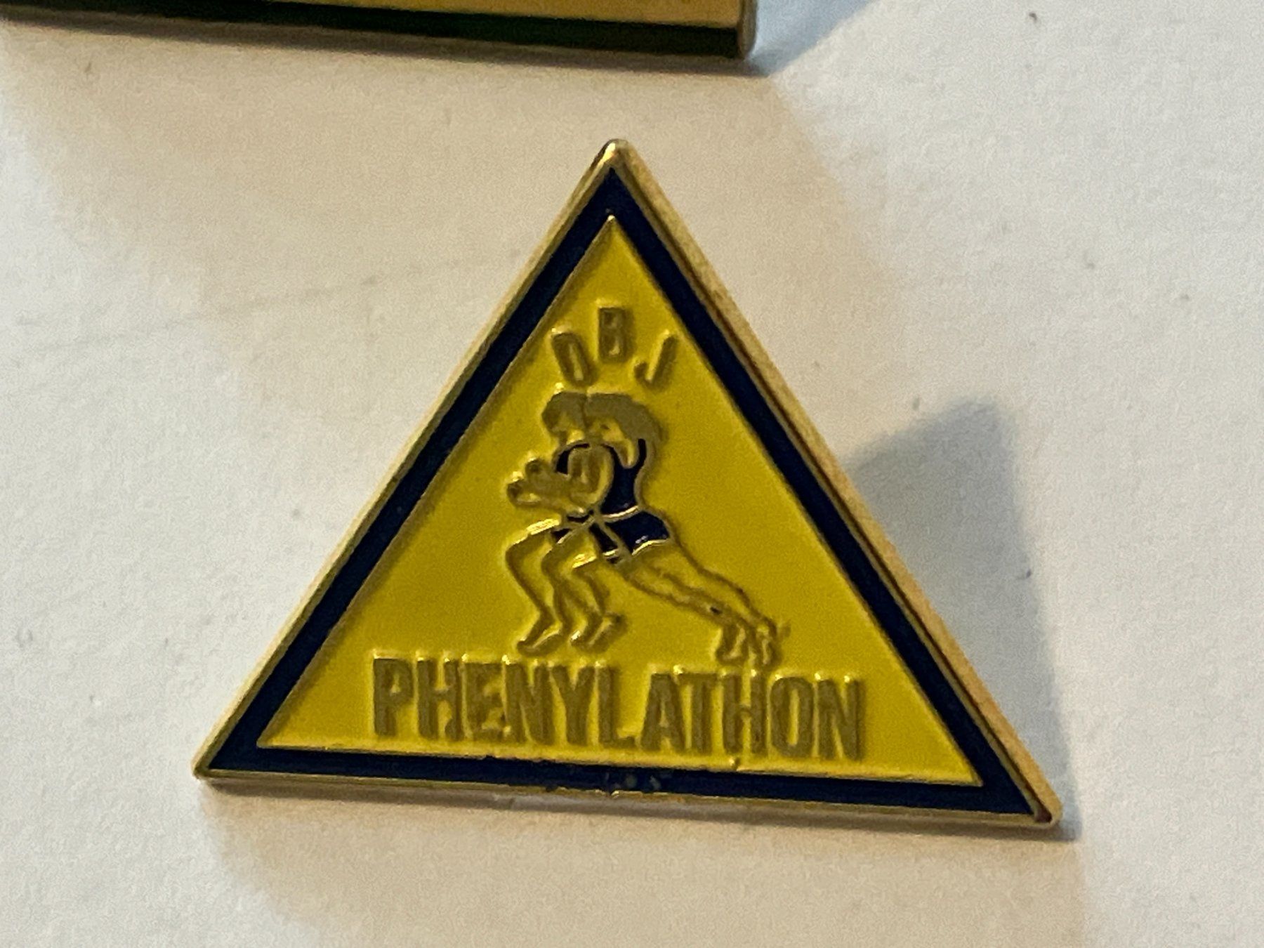 Plaketten & Abzeichen: 1 Pin Phenylathon OBJ – Gebraucht aus Basel von djwwpp