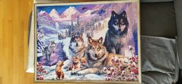 Bild Wolfsfamilie aus Steinchen Winterlandschaft gerahmt