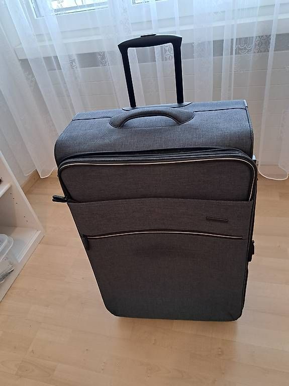 Valises de voyage: 1 Rollkoffer Neuwertig – D'occasion à Staufen par boerny