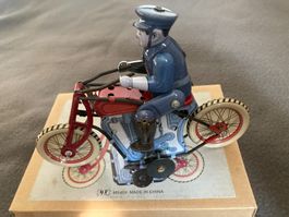 Blechfigur aufziehbar, Polizist auf Motorrad, Sammlerartikel