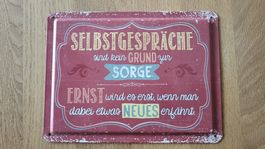 Schild mit Spruch