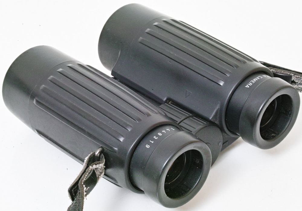 A PAIR OF LEITZ TRINOVID BINOCULARS with 10x40B magnification in