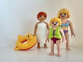 PLAYMOBIL Strandtag – Familie mit Schwimmweste & Schwimmtier