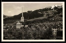 AK Kerns, Kirche und Dorf mit Bergkulisse