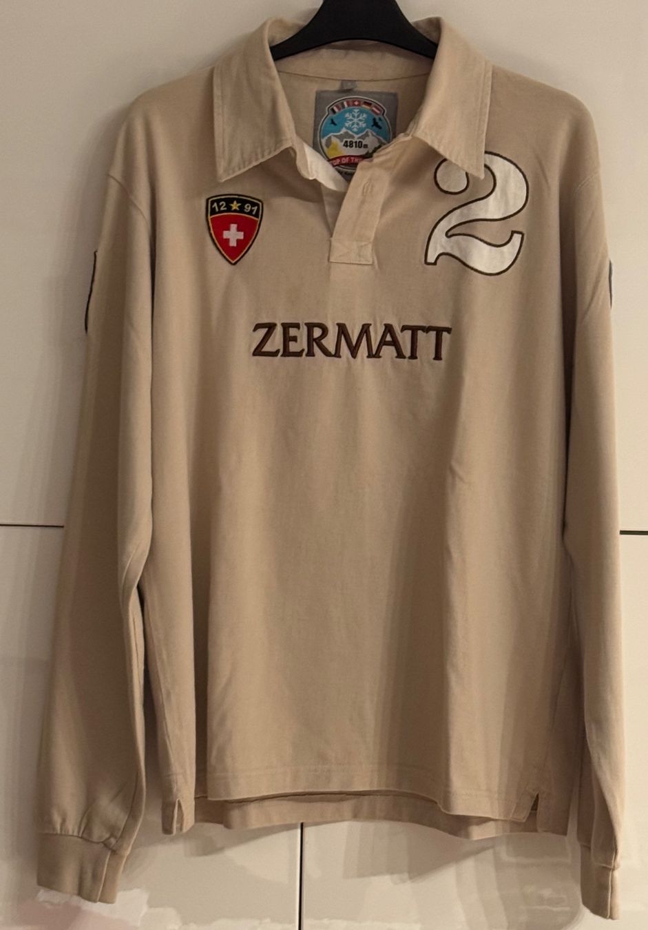 Maglioni & Felpe: Polo sweat pull homme, beige, taille S – Nuovo e nell'imballaggio originale da Genève venduto da OnSale