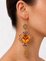 Boucle d’oreille artistique “ COEUR DE CYGNE SYMÉTRIQUE “