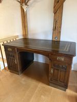 Antique oakwood desk with leather top