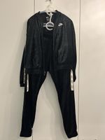 Nike Trainingsanzug Samt schwarz Grösse XL 156-166cm