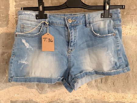 Shorts en jean femme T.36 délavé