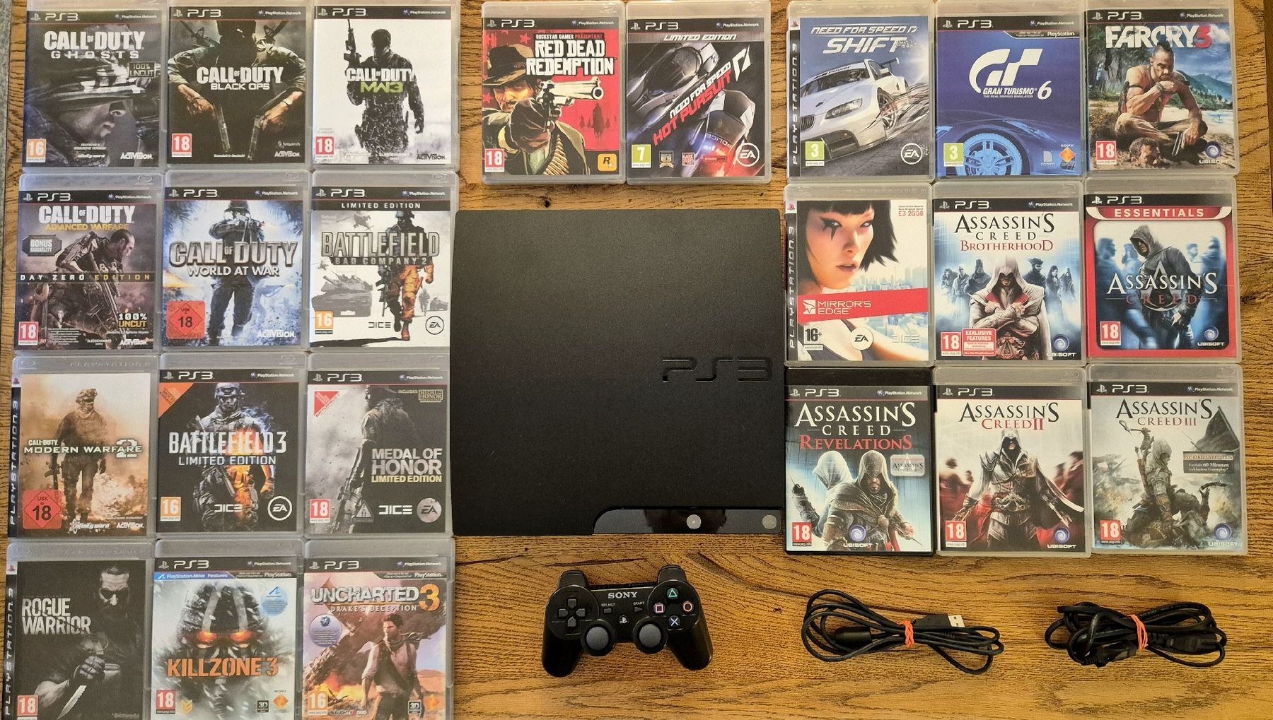 Sony Console: Sony PlayStation 3 + Controller + 23 Spiele – Usato da Au SG venduto da KonsoleWerk