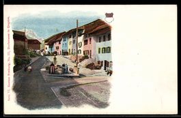 AK Gruyère /Kt. Freiburg, Straßenpartie, Frauen am Brunnen