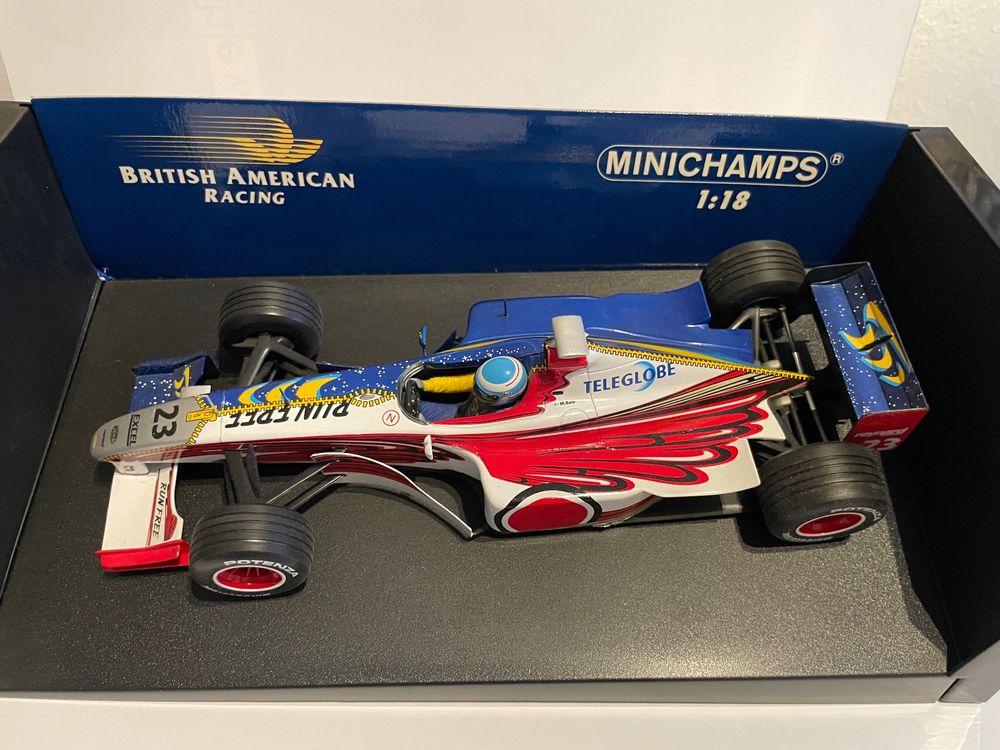 Auctions | Minichamps 1/18 scale pair (1) 100060012 Honda Racing F1 Team RA106 - J. Button (2) 100010010 B.A.R Honda 03 - J. -villeneuve - Near Mint to