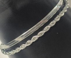 Bracciali corda e serpente argento da donna