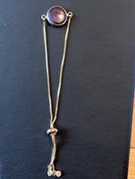 Bracelet doré cabochon violet sombre