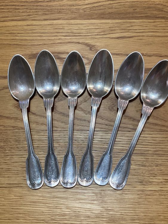 Suite de 6 cuillères à soupe + 6 à café en métal argenté