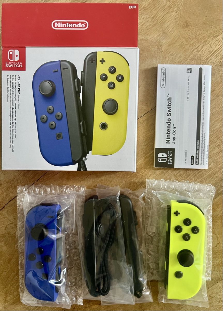 Nintendo Controller: Nintendo Switch Joy-Con Blue/Yellow - OVP – Nuovo (secondo la descrizione) da Lausanne venduto da Polokus 1