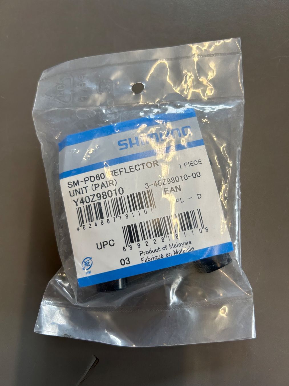 Shimano Pezzi di ricambio: Shimano SM-PD60 Reflector Unit (Nr.046) – Nuovo e nell'imballaggio originale da Winterthur venduto da Veloteileauktion