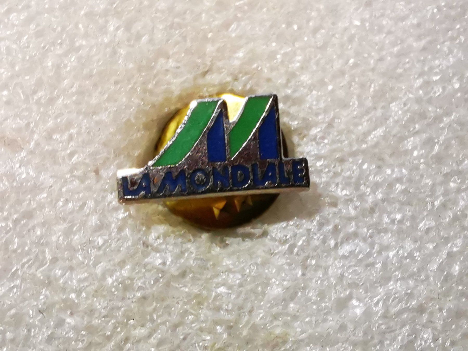 Placchette & Badge: Ansteckpin 80: La Mondiale – Usato da Oppligen venduto da Pin-Fall-Shop