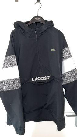 Veste Lacoste noire capuche taille L état neuf