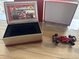 Modellauto 1987 Ferrari F1 87 mit Box und Beschreibung