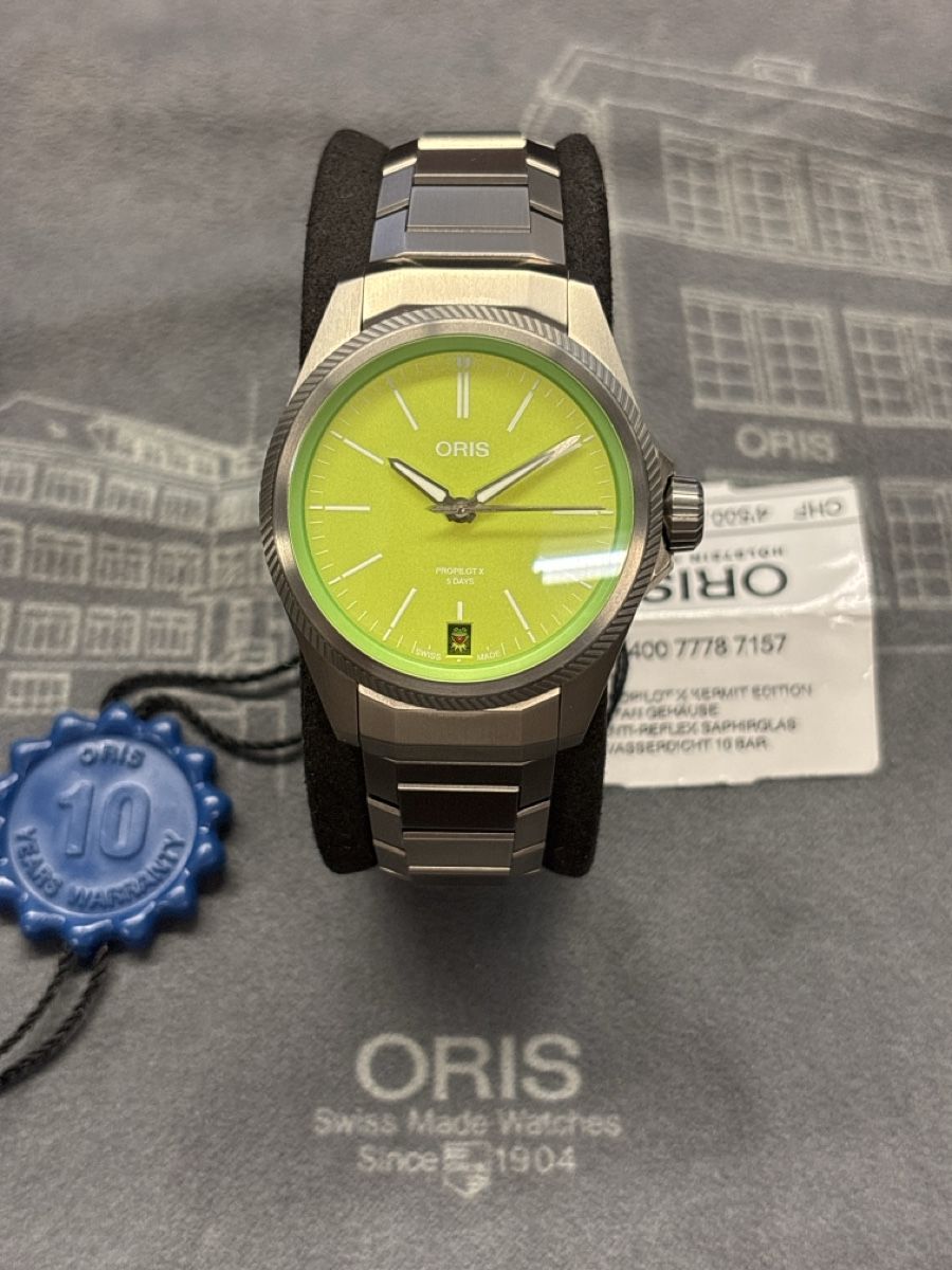 Oris Montres: Oris ProPilot X Kermit Edition titanium watch new condition – Neuf (Voir description) à Zermatt par Wega.Boutique