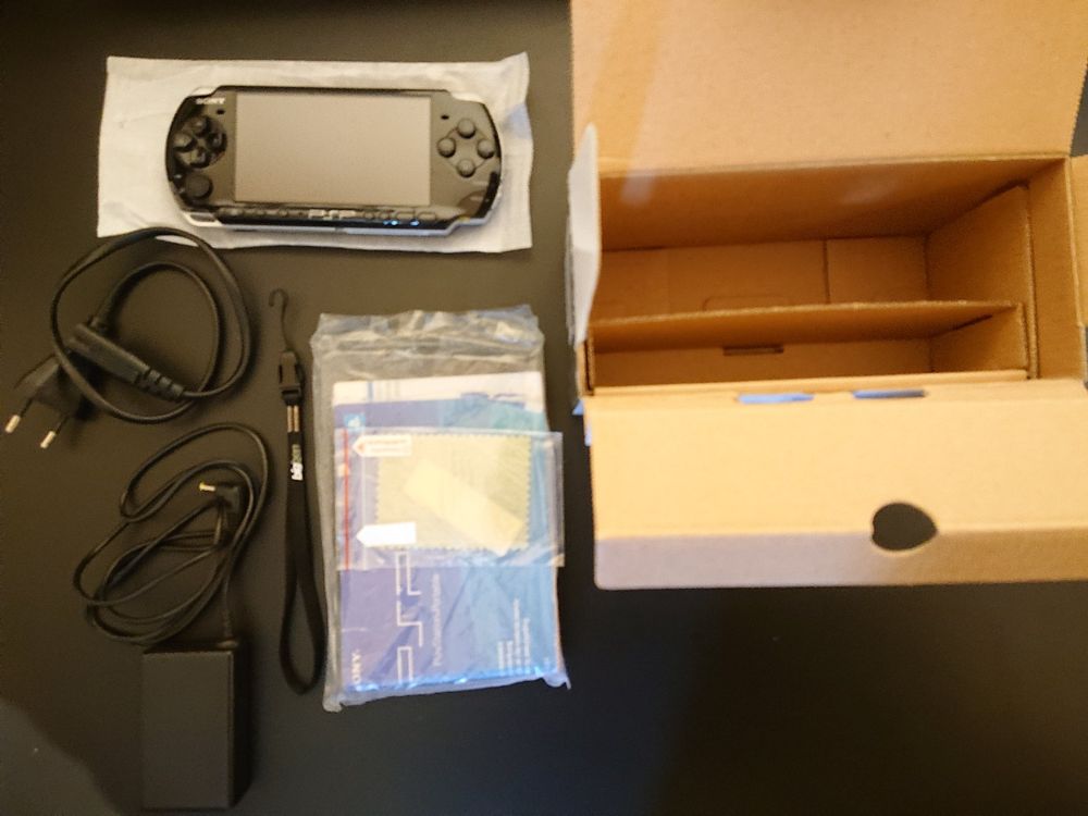Sony PSP Slim & Lite (3004) schwarz verkaufen