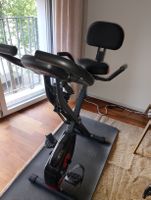 Heimtrainer mit Ergometer