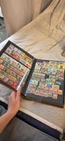 Briefmarken Album mit internationalen Marken gemischt