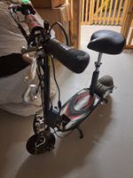 Elektro Scooter schwarz mit Sitz gebraucht Zustand