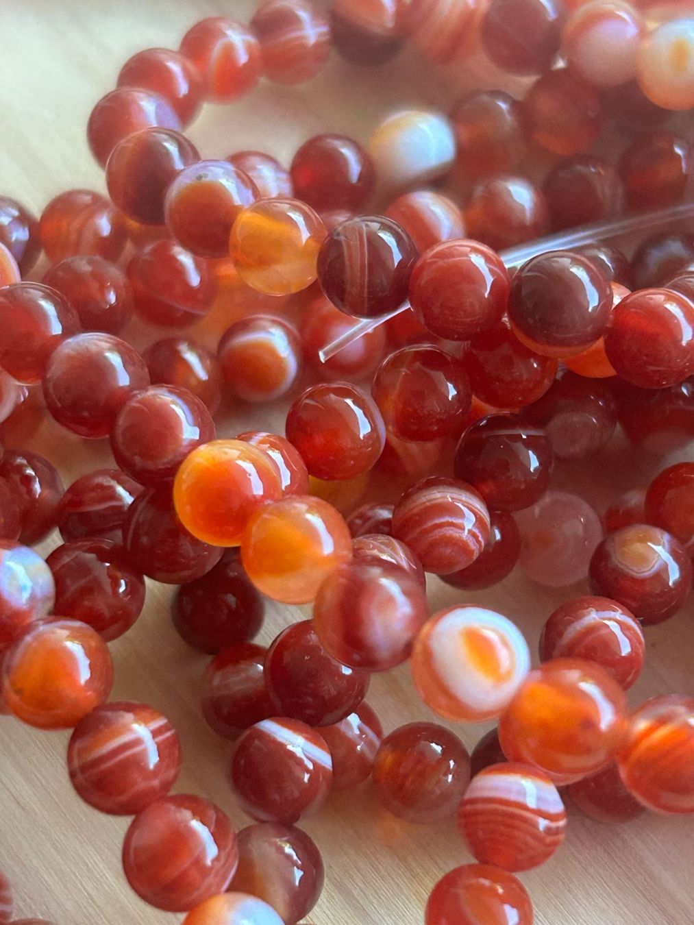 Pietre preziose: Strang echte red striped agate beads 6mm – Nuovo e nell'imballaggio originale da Niederrohrdorf venduto da Ytobi 2
