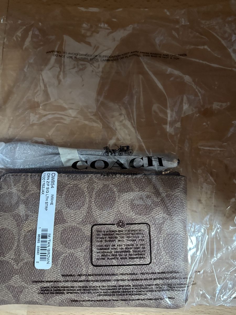 Coach Borse da donna: Coach Wristlet  braun mit Monogramm neu – Nuovo e nell'imballaggio originale da Schaan venduto da Filipipa 2