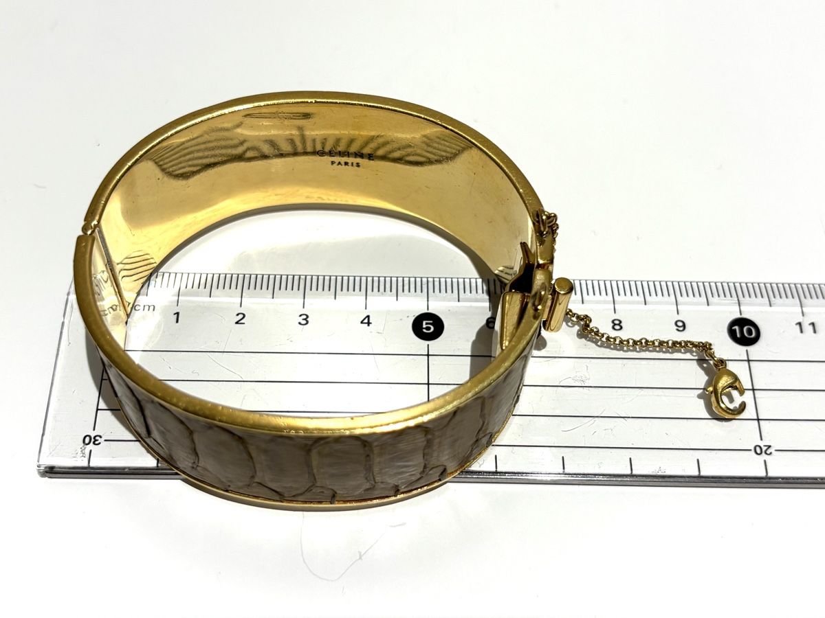 Celine Bracelets: CELINE Gold Plexi Python Bangle – D'occasion à Winterthur par Atelier.W 6