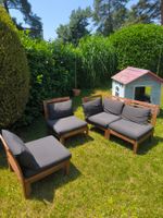 Garten Lounge Holz mit schwarzen Polstern