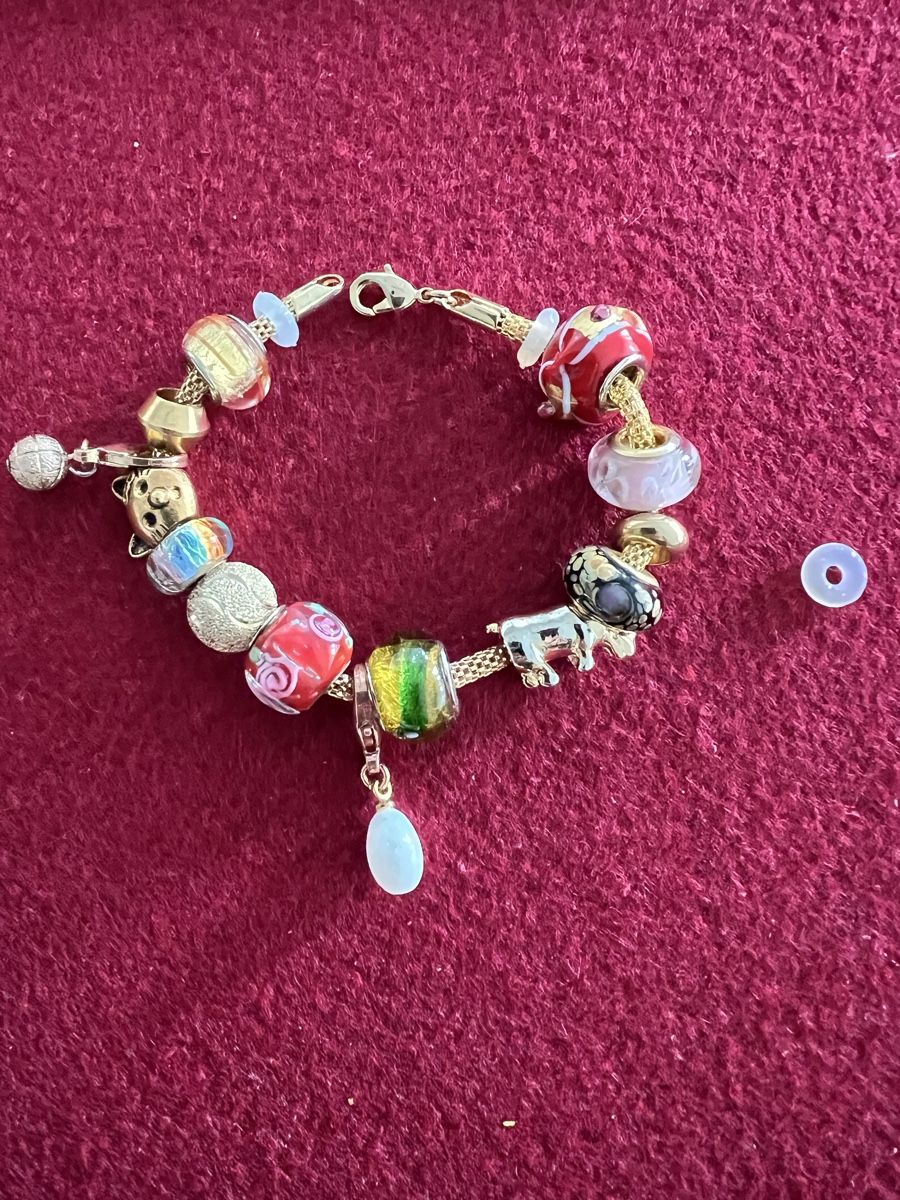 Bracciali & Braccialetti: Armband in Farbe Gold mit 14 Charms – Usato da Pfäffikon ZH venduto da Ruth8