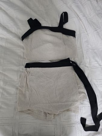 Two-Piece Set Beige Top and Skort with Black Trim Details