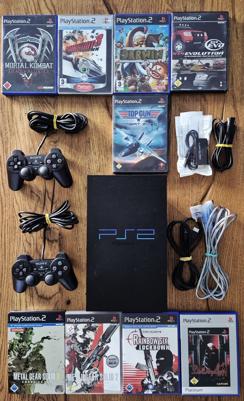 Sony Console: Sony PlayStation 2 + 2 Controller + 9 Spiele – Usato da Au SG venduto da AlenCompany