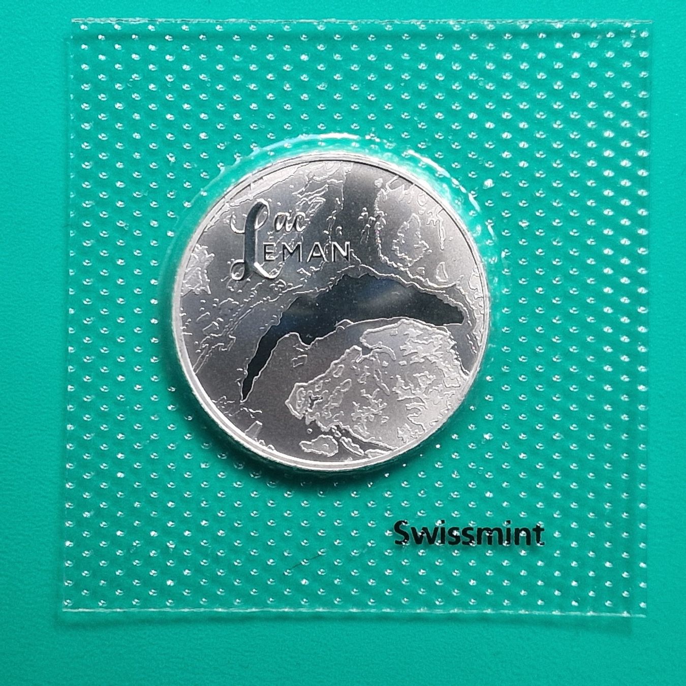 Tutti le monete: CHF 20.- Swissmint 2026, Lac Léman – Nuovo e nell'imballaggio originale da Bouveret venduto da psv01 2