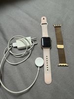 Apple Watch Rose Gold mit zwei Armbändern und Ladegerät