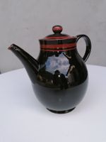 Keramik-Teekrug von F. + H. Hausmann (schwarz / braun)