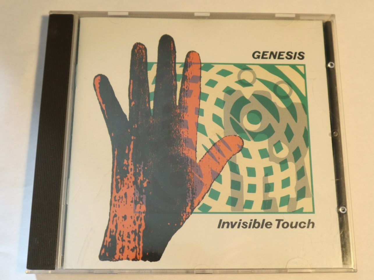 CDs: CD Genesis Invisible Touch – D'occasion à Eschenbach SG par Astalavista