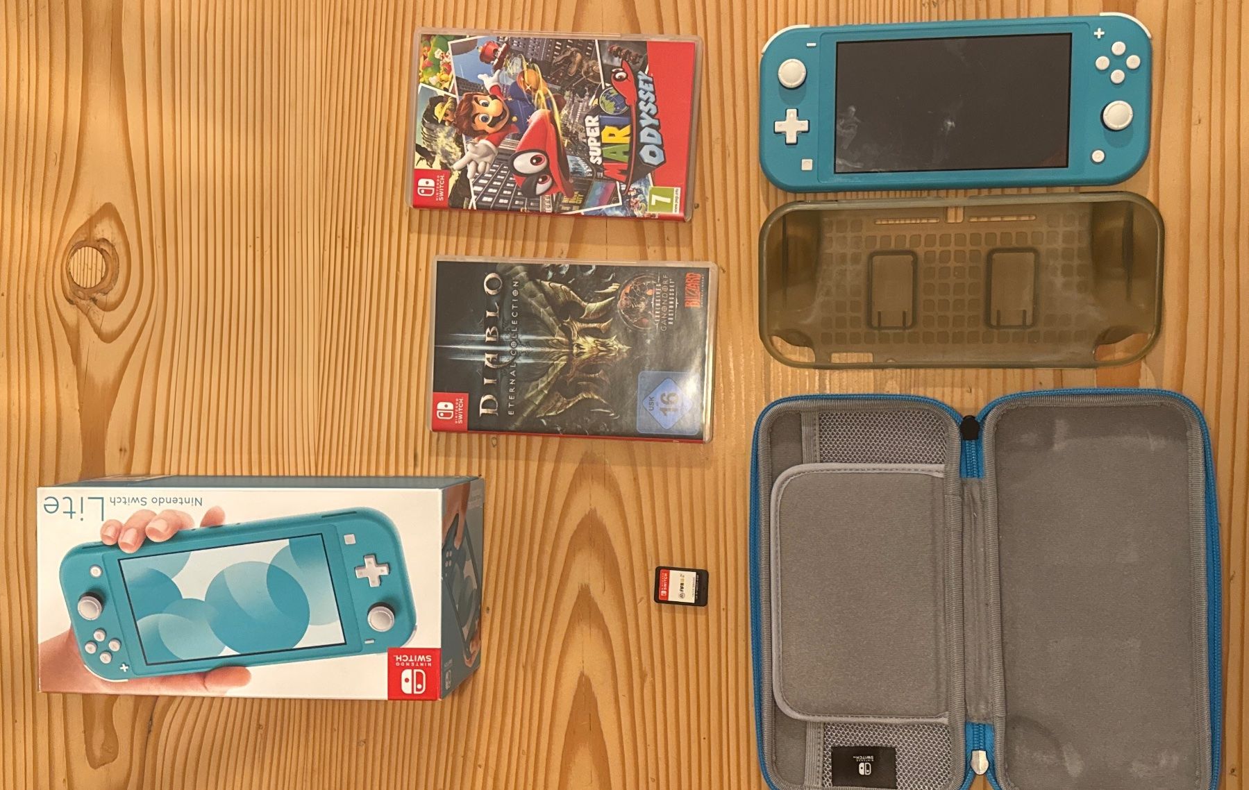 Nintendo Console: Nintendo Switch Lite türkis mit 3 Spielen – Usato da Zürich venduto da Schurty6