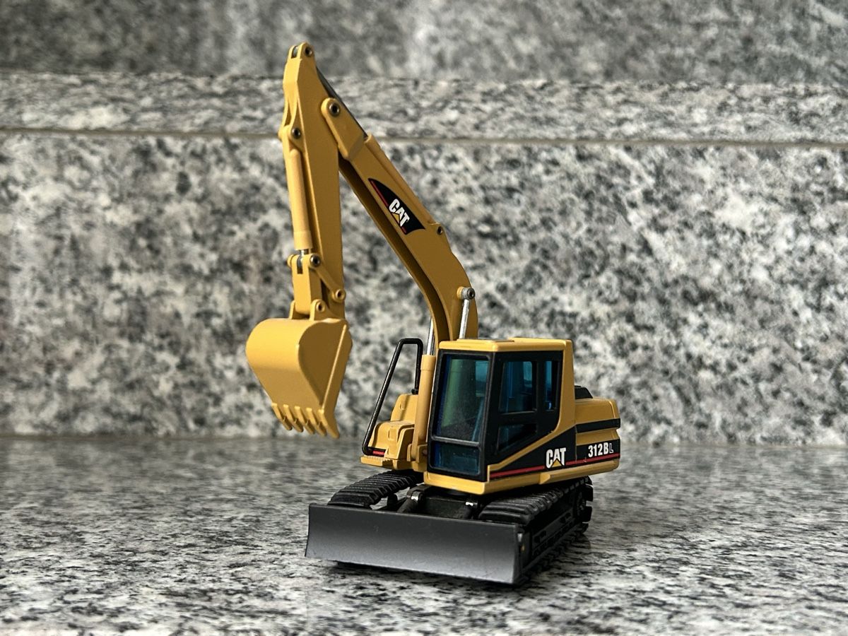 Caterpillar Kit di modellismo & Modellini statici: Cat 312 B , 1:50 , NZG – Usato da Horw venduto da Tigercat635 1