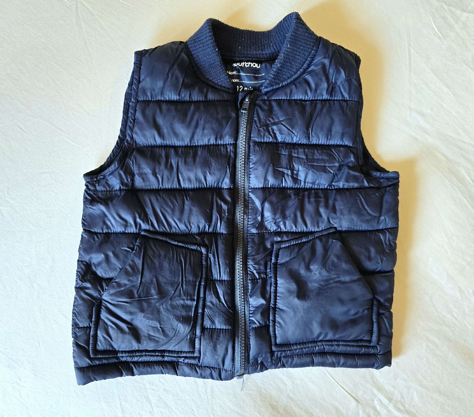 Altro abbigliamento: Gilet matelassé sans manches, taille 12 mois – Usato da Genève venduto da cec_d6pg