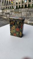 Vintage Blechdose mit floralem Muster