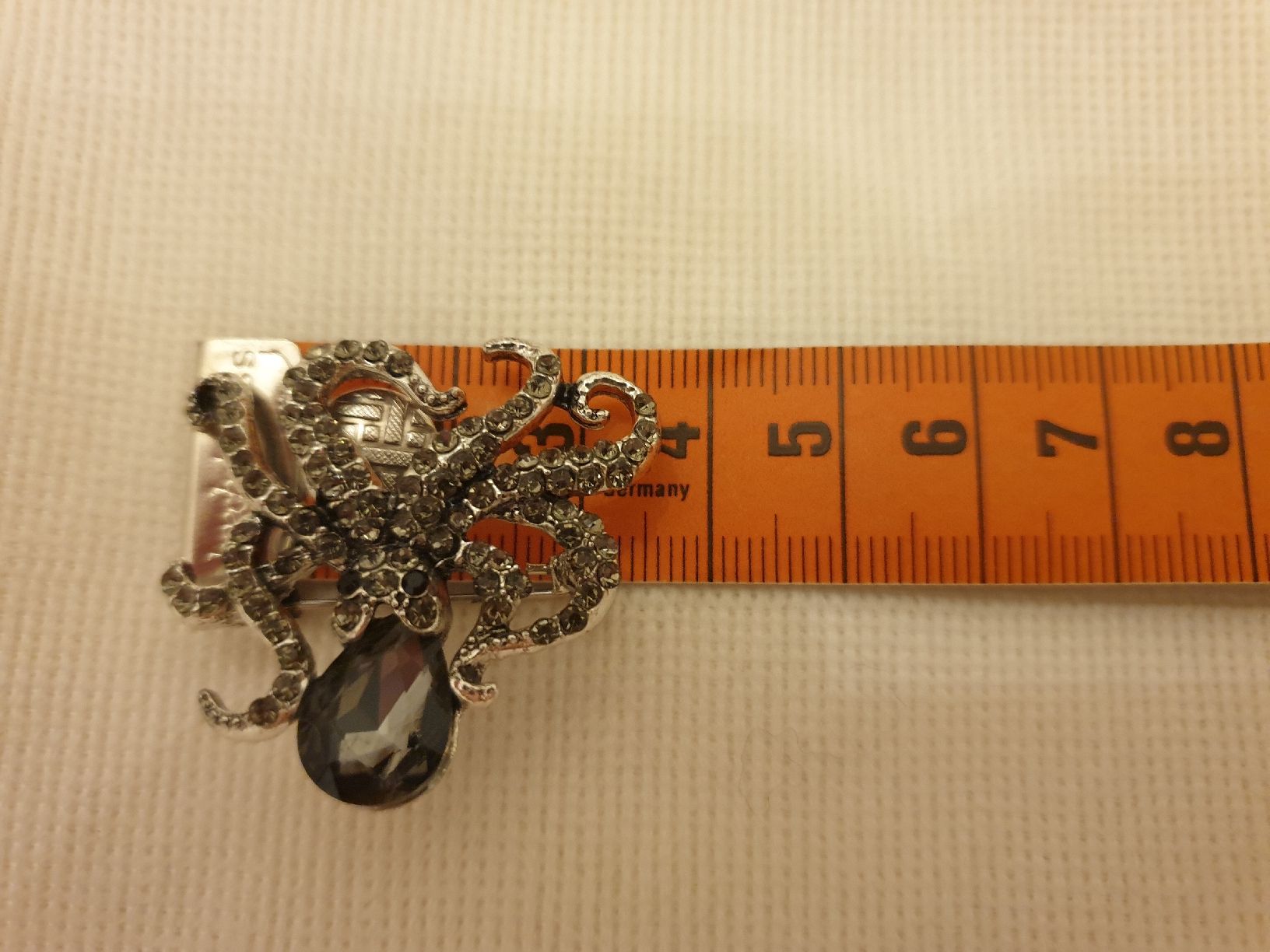 Spille & Fermagli: Broche métallique pieuvre, zircone, comme neuve – Nuovo (secondo la descrizione) da Neuchâtel venduto da Verenas12 3
