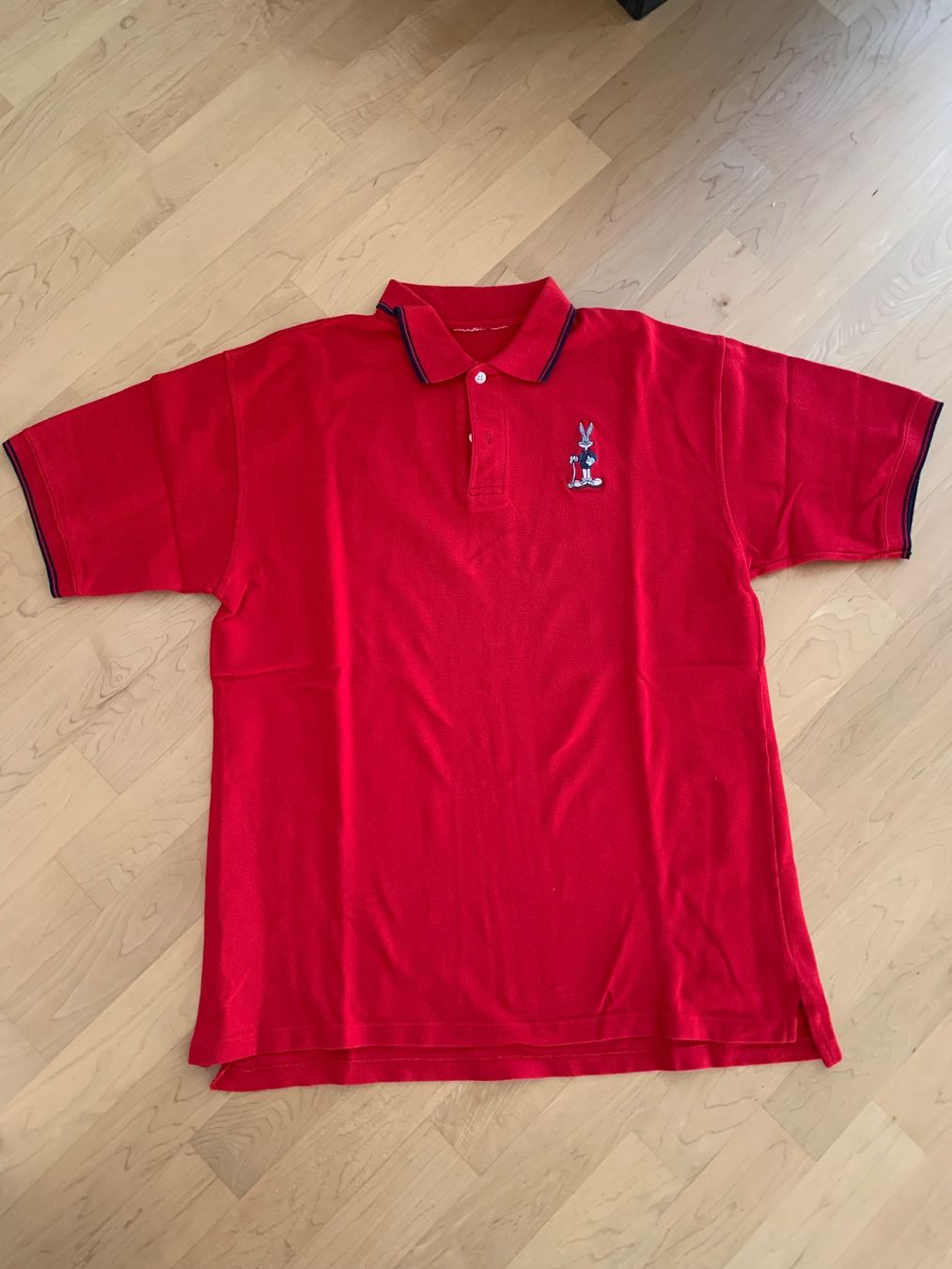 Magliette Polo: Bugs Bunny Polo Shirt – Usato da Ennetbaden venduto da usemiste