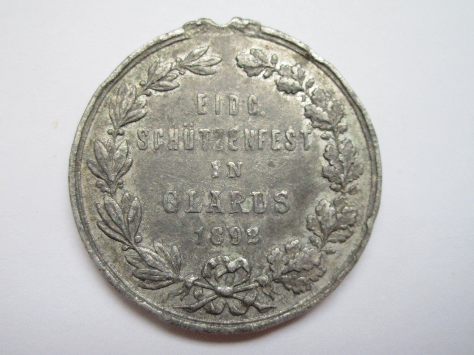 Medaillen: Medaille  Eidg. Schützenfest in Glarus 1892 – Defekt aus Heimberg von Lupo57