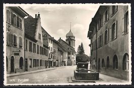 Zurzach, Strasse mit Brunnen, Blick zur 