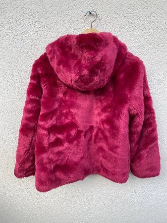Veste rose en fourrure, reversible