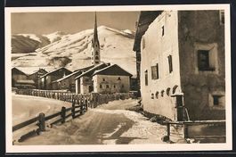Zuoz, Teilansicht mit Kirche im Schnee